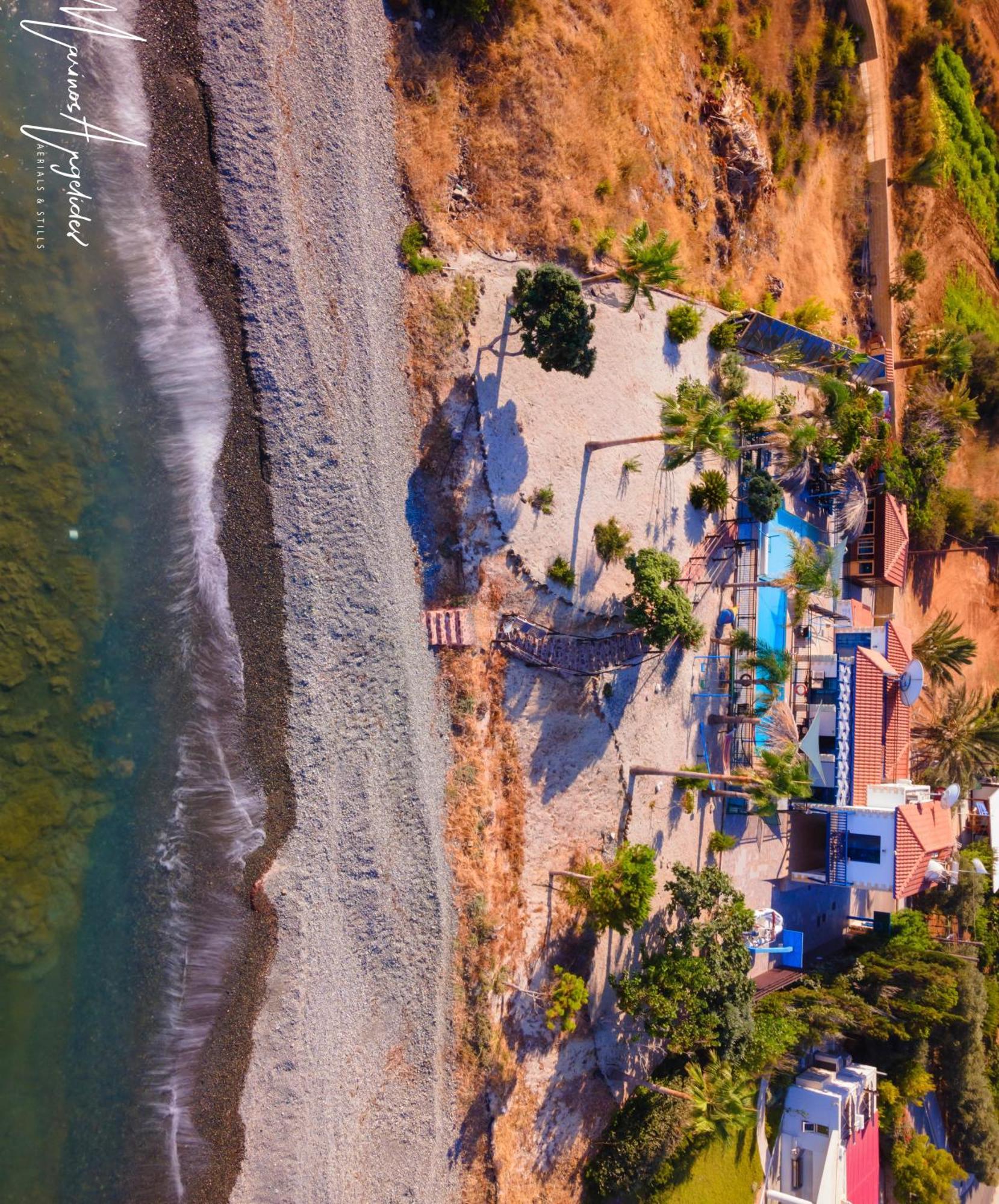 Astrofegia Beachfront Villa Помос Екстериор снимка